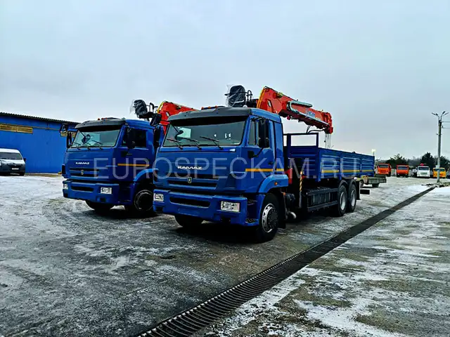 КАМАЗ 65117 бортовой с КМУ Kanglim KS2056H